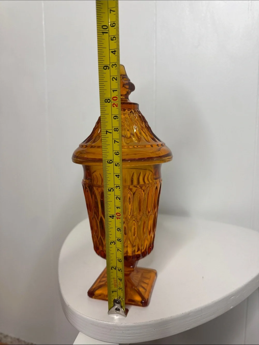 Orange glass pedestal candy dish